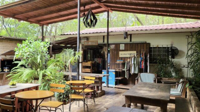 Machete Market Café Charming outdoor seating and vibrant food offerings at Machete Market Café in San Juan del Sur, known for its fresh, locally sourced meals and coffee