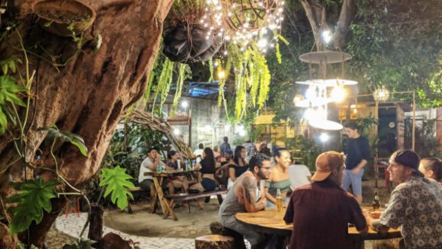 Wood-fired pizzas served at Sauce restaurant with outdoor seating in San Juan del Sur, Nicaragua