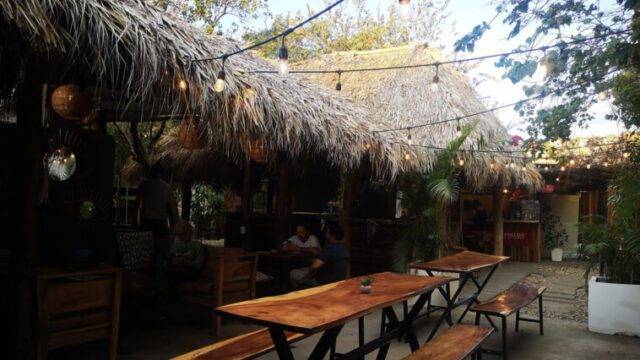 Lively open-air dining space at Gastro Garden with global food stalls in San Juan del Sur, Nicaragua