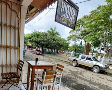 Cozy interior of Indio del Sur Coffee Shop with specialty coffee and vegan-friendly menu in San Juan del Sur, Nicaragua
