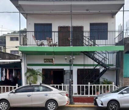 Hostel Rossy's exterior view showcasing its proximity to San Juan del Sur Beach in Nicaragua