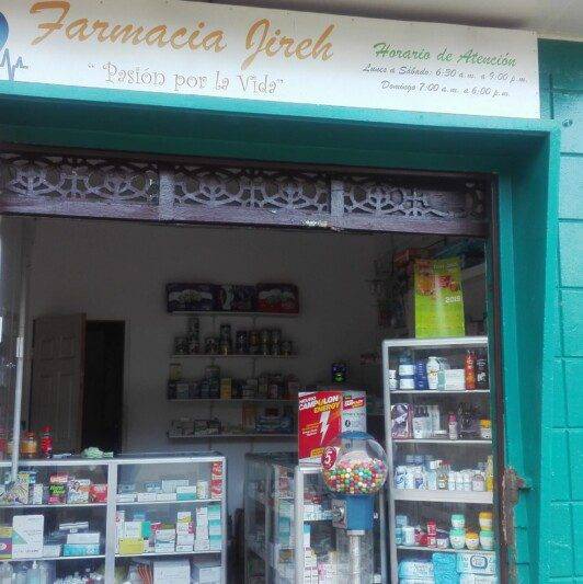 Farmacia Jireh storefront on Avenida El Abanil in San Juan del Sur, Nicaragua, offering a wide range of pharmaceutical services