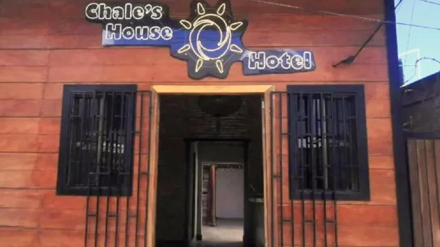 Chales House Hotel exterior with terrace and hammocks in San Juan del Sur, Nicaragua