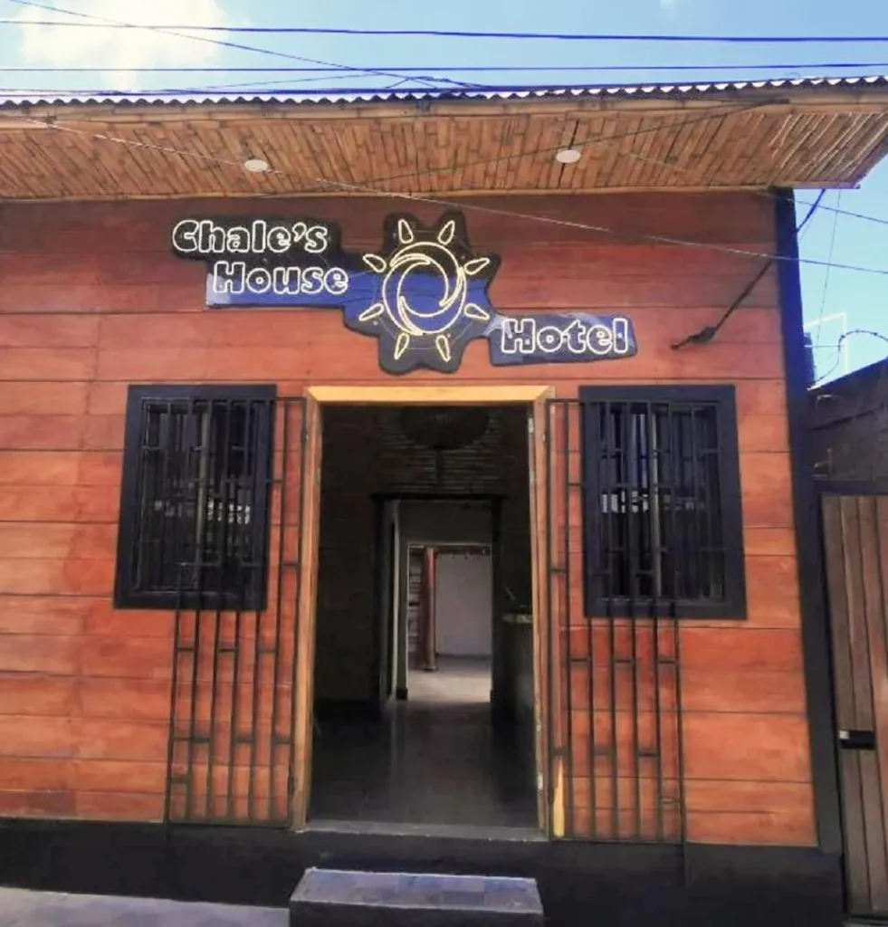 Chales House Hotel exterior with terrace and hammocks in San Juan del Sur, Nicaragua