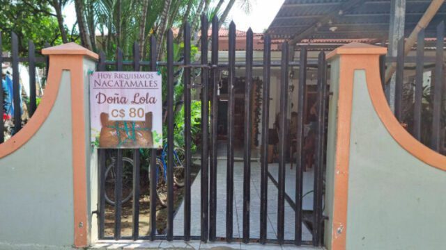 Doña Lola Nacatamales in San Juan del Sur view from the road - serving traditional homemade Nicaraguan nacatamales wrapped in banana leaves.