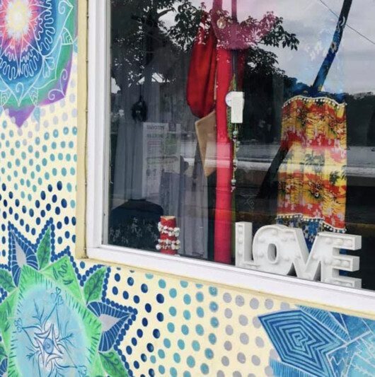 Colorful boutique display at Love in Love Clothing in San Juan del Sur, showcasing vibrant women's fashion.