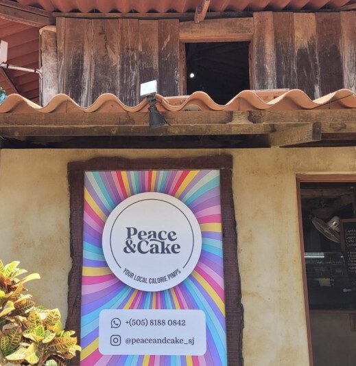 Peace & Cake café at Finca Las Nubes, offering organic pastries and a cozy atmosphere in San Juan del Sur, Nicaragua.