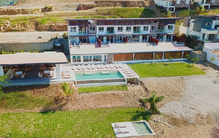 Facade of La Santa Maria Boutique Hotel & Residences with ocean view in San Juan del Sur