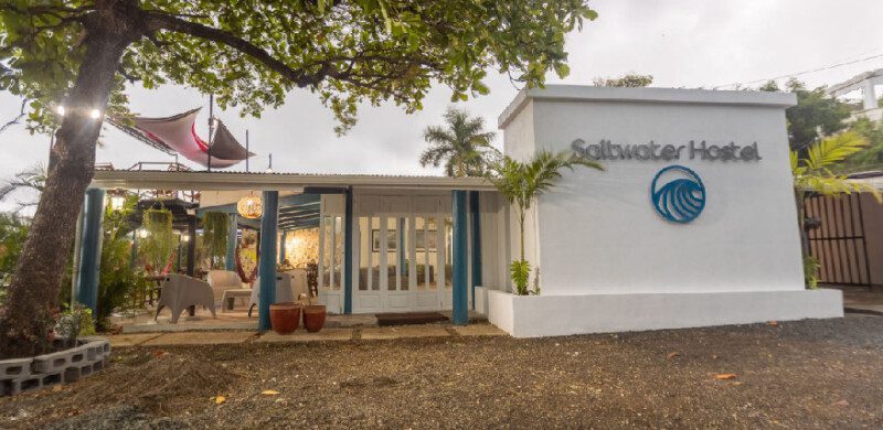 Exterior view of Saltwater Hostel with garden lounge in San Juan del Sur, Nicaragua
