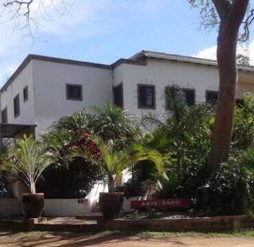 Arte-Sano Hotel Cafe's outdoor pool area with ocean view in San Juan del Sur, Nicaragua