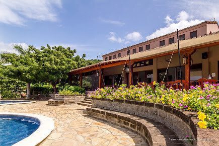 Terrace dining area at Terraza de Palermo with panoramic views of San Juan del Sur bay