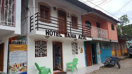 Front view of Hotel Posada Bahía Azul with colorful exterior in San Juan del Sur, Nicaragua