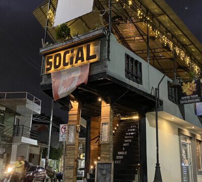 El Social Pool & Patio image of frontage of the building, dining and cocktails in San Juan del Sur