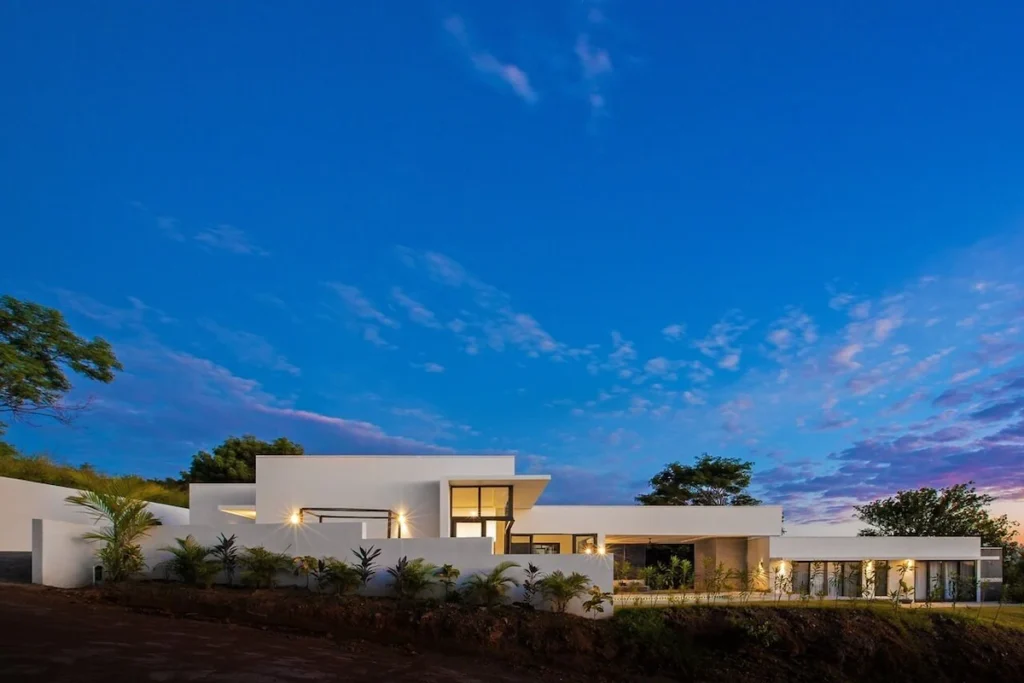 Exterior view of Casa Chill with infinity pool overlooking Nacascolo Bay in San Juan del Sur