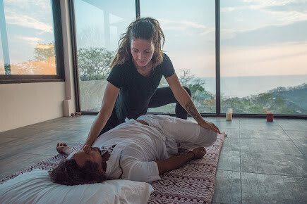 Yoga session at Pranamaya Healing Arts studio Playa Maderas