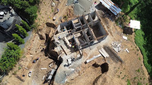 Construction workers from Rugama Constructions working on a building framework in San Juan del Sur, Nicaragua