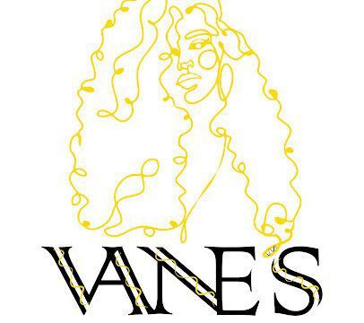 Interior of Vanes Braids & Beauty showing a stylist braiding hair with tools and beauty products in a cozy, well-lit salon in San Juan del Sur