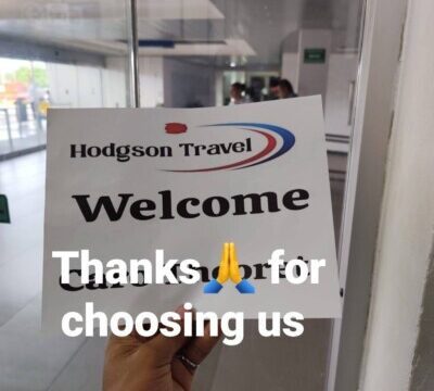 Hodgson Travel Transport shuttle van arriving at Managua Airport