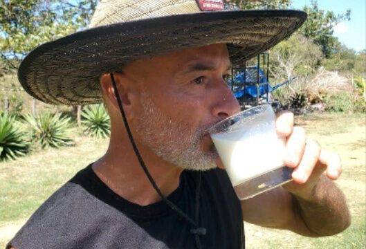 Fresh raw Jersey cow milk in glass bottle from Farmer Paul near San Juan