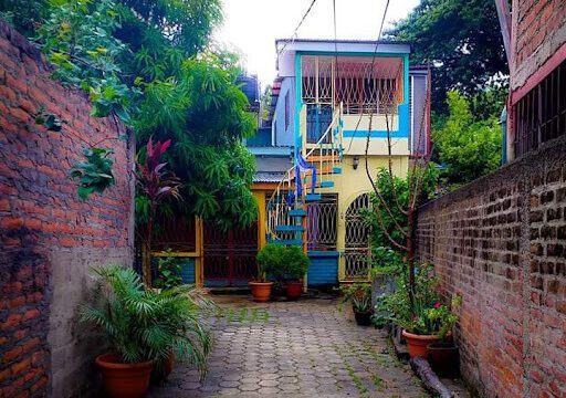 Exterior view of Mamá Adela Home Rental in San Juan del Sur, Nicaragua – Family-friendly lodging with a pool and patio