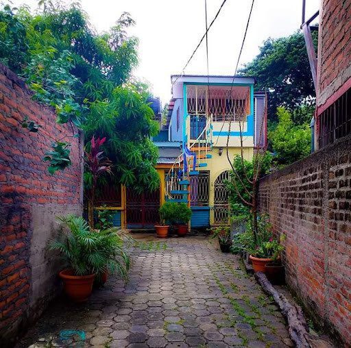 Exterior view of Mamá Adela Home Rental in San Juan del Sur, Nicaragua – Family-friendly lodging with a pool and patio