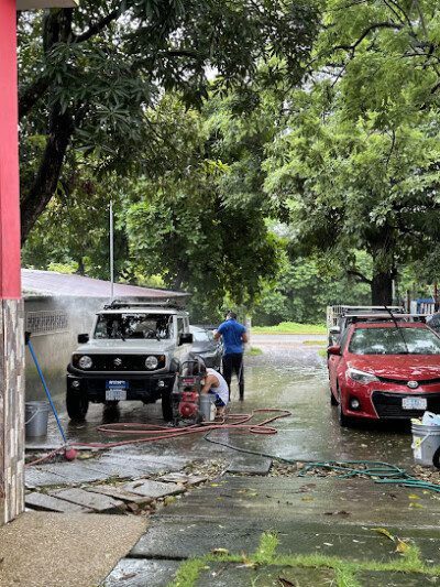 Exterior view of Car Wash Palermo in San Juan del Sur, Nicaragua, showcasing vehicle cleaning services