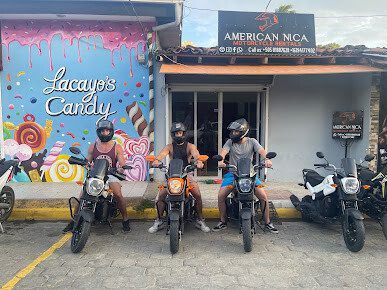 American Nica Rentals motorcycles parked ready for rental in San Juan del Sur