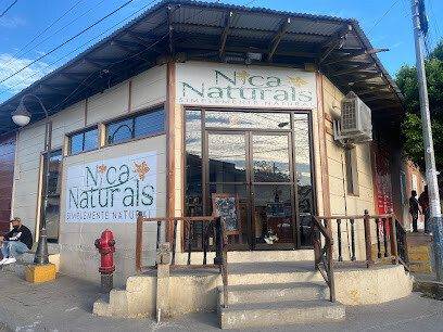 Exterior of Nica Naturals shop in San Juan del Sur showing a clean storefront with handmade soaps, skincare products, and natural gifts displayed inside