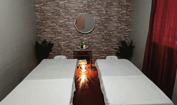 Precisión Wellness Spa interior of a treatment room with two treatment beds