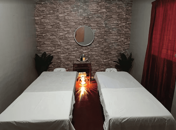Precisión Wellness Spa interior of a treatment room with two treatment beds