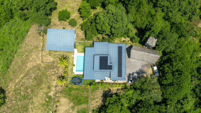 Closer Up Aerial View of Equestrian Estate with new 3-bedroom home with 2 bedroom casita with pool listed by Discover Real Estate