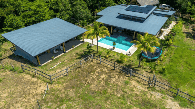 View from above of Equestrian Estate with new 3-bedroom home with 2 bedroom casita with pool listed by Discover Real Estate