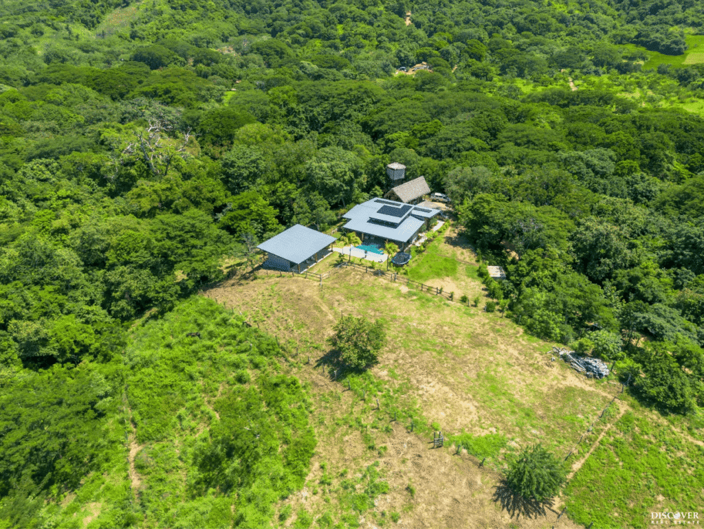Closer Aerial view of Kitchen at Equestrian Estate with new 3-bedroom home with 2 bedroom casita with pool listed by Discover Real Estate