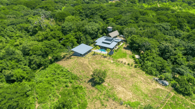 Closer Aerial view of Kitchen at Equestrian Estate with new 3-bedroom home with 2 bedroom casita with pool listed by Discover Real Estate