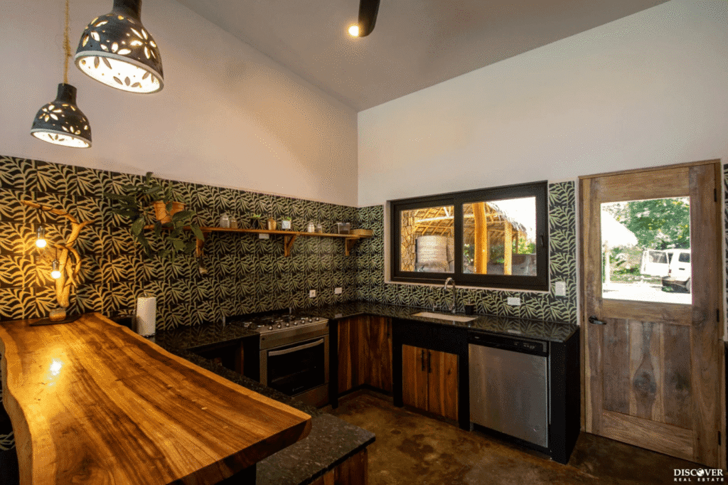 View 2 of Close up view of breakfast bar into kitchen area of main house of the equestrian estate listed by Discover Real Estate