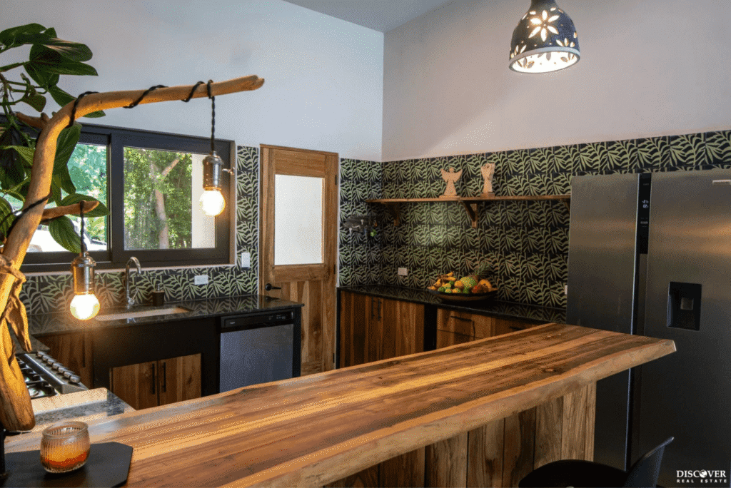 Close up view of breakfast bar into kitchen area of main house of the equestrian estate listed by Discover Real Estate