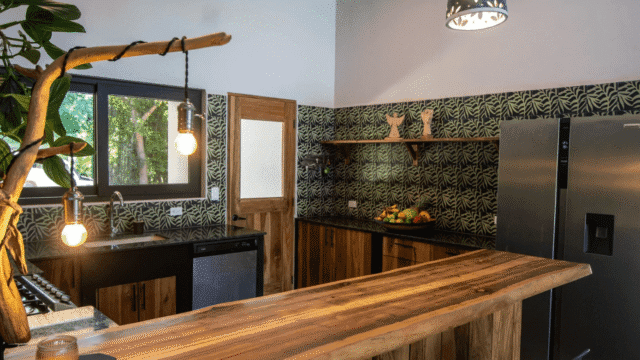 Close up view of breakfast bar into kitchen area of main house of the equestrian estate listed by Discover Real Estate