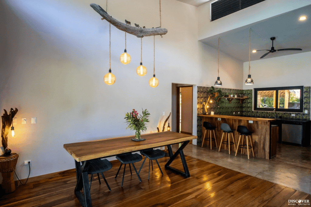 View 2 of View of dining table and kitchen breakfast bar area of equestrian estate listed by Discover Real Estate