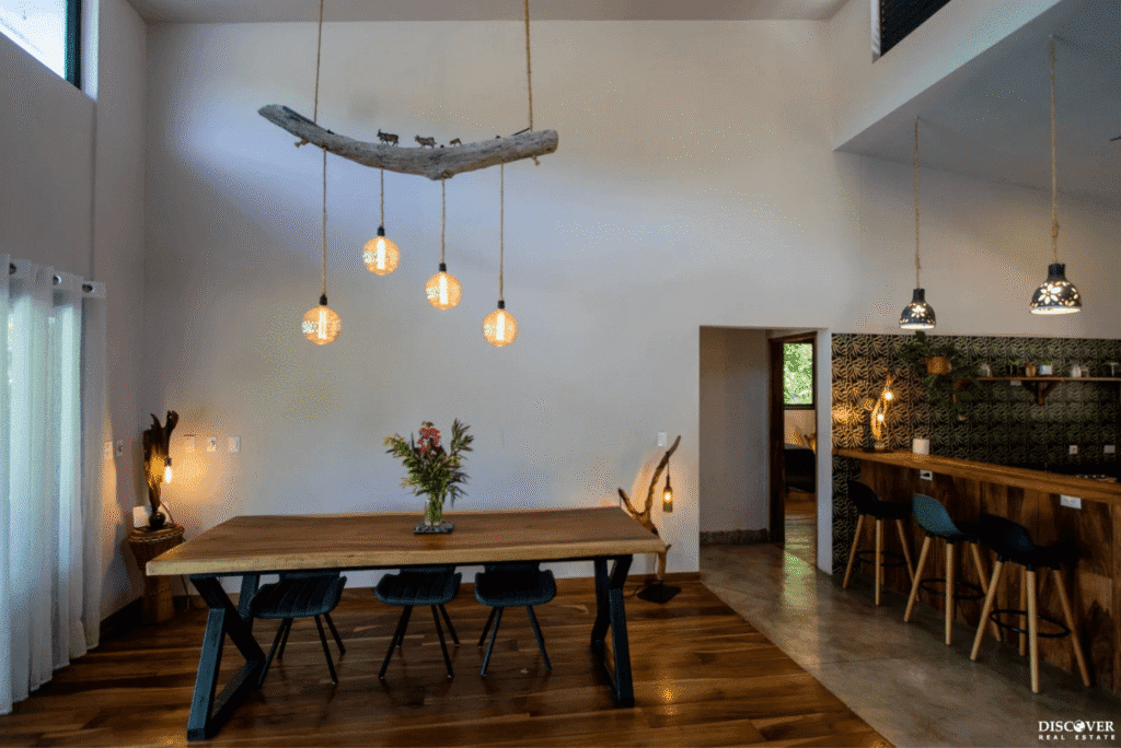 View of dining table and kitchen breakfast bar area of equestrian estate listed by Discover Real Estate