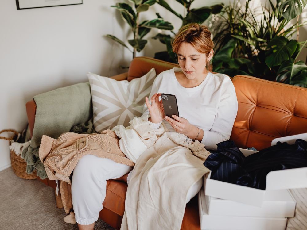 Finding Thyroid Medication Abroad T3 Access - Image of a woman looking overwhelmed, on the phone trying to find her medication from abroad.