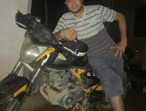 Technician Alan repairing a washing machine and servicing an air conditioner unit