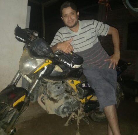 Technician Alan repairing a washing machine and servicing an air conditioner unit